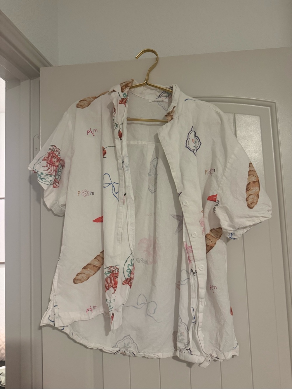 White Short-Sleeve Button-Up Shirt with Bakery Print